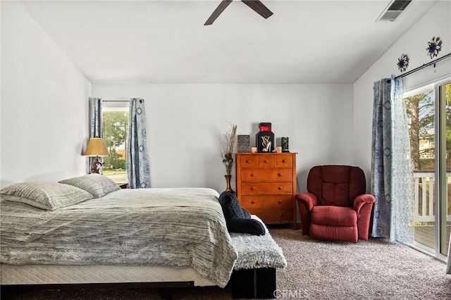 bedroom with carpet flooring, ceiling fan, access to outside, and multiple windows