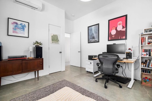 office featuring concrete flooring and a wall unit AC