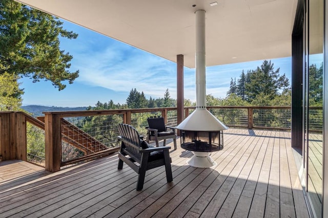 deck featuring a fire pit