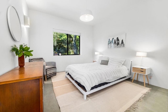 bedroom with concrete flooring