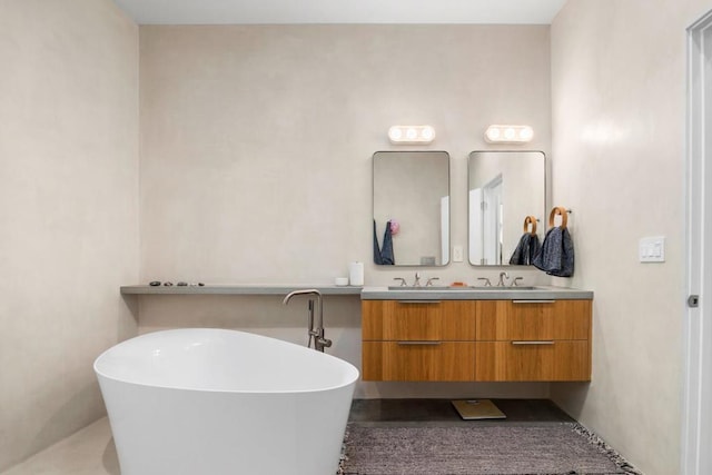 bathroom with vanity and a bathtub