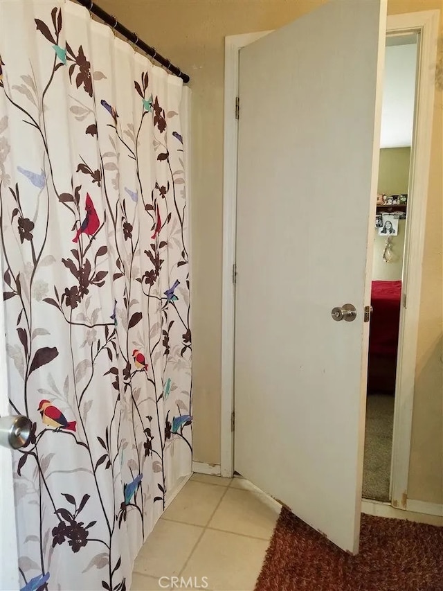 bathroom featuring tile patterned floors