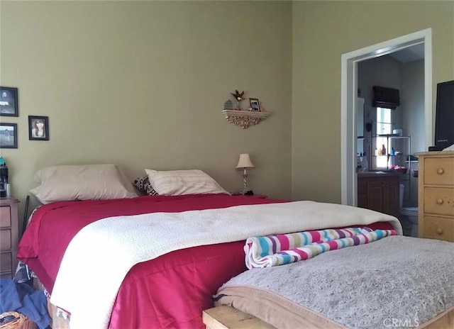 bedroom featuring ensuite bathroom