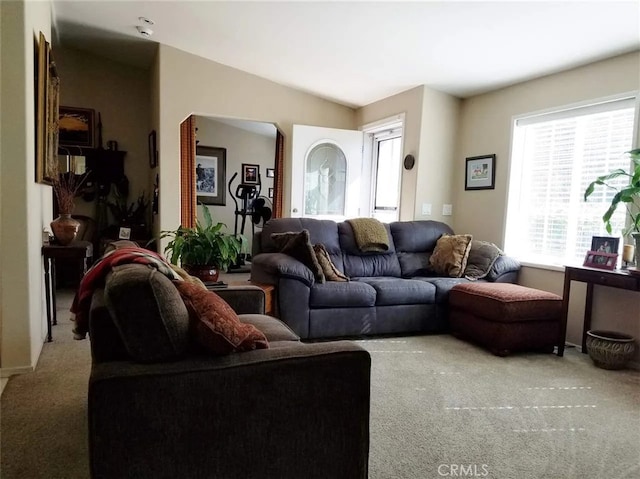 living room with light carpet and lofted ceiling