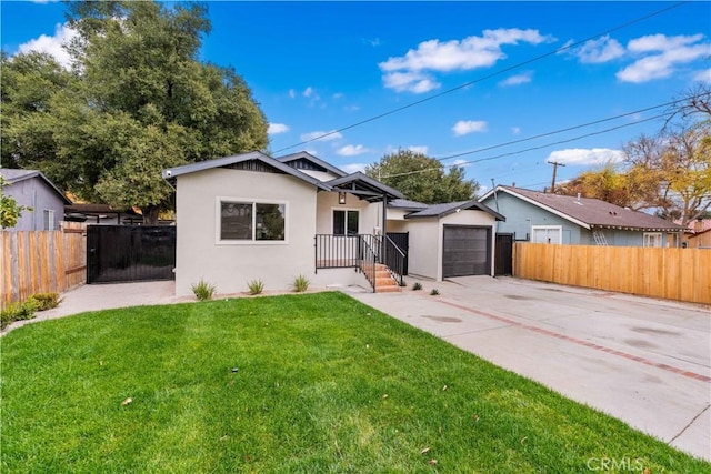 bungalow-style home with a garage and a front yard