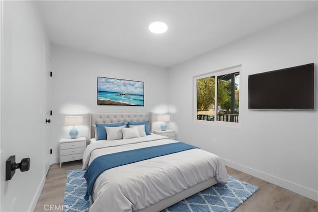 bedroom featuring light hardwood / wood-style flooring