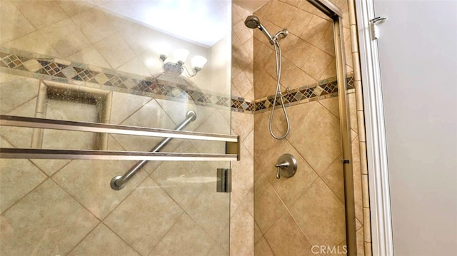 interior details with an enclosed shower