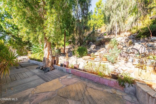 view of patio with a wooden deck