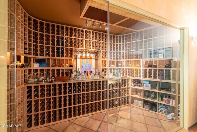 wine room featuring tile patterned flooring