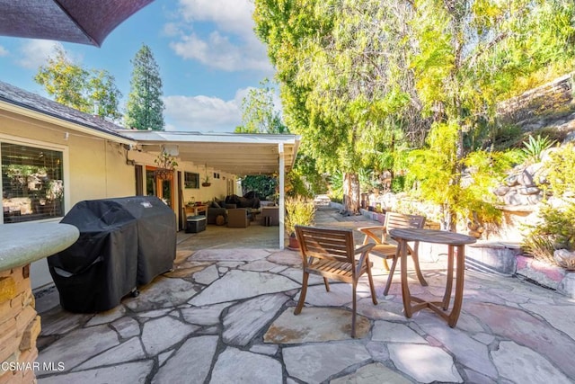 view of patio / terrace with grilling area and outdoor lounge area