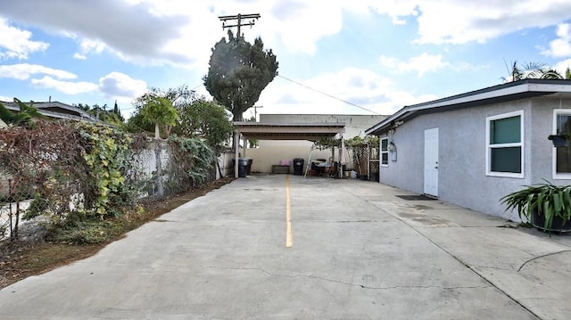 view of car parking with a carport