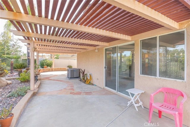 view of patio / terrace with a pergola and central AC