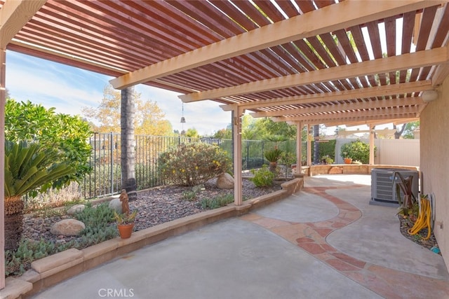 view of patio / terrace with a pergola and central AC