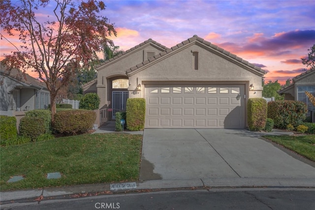 view of front of home with a garage