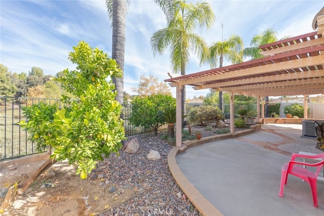 view of patio / terrace featuring central AC unit and a pergola