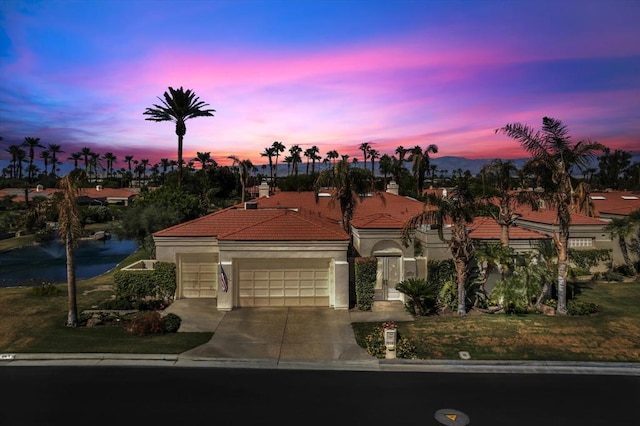 view of front of property featuring a garage