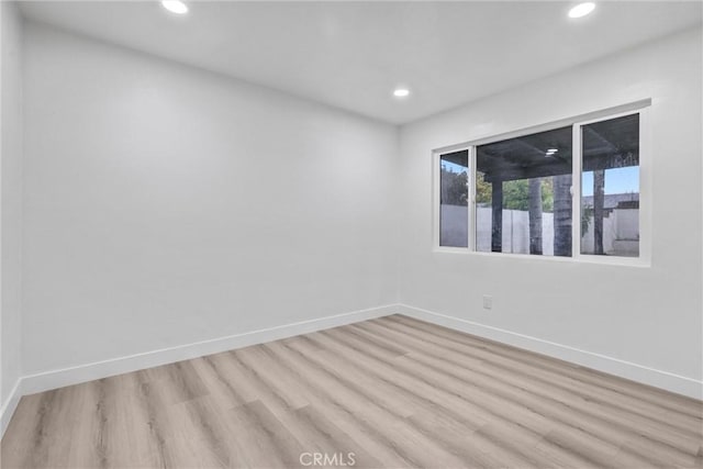 empty room with light wood-type flooring