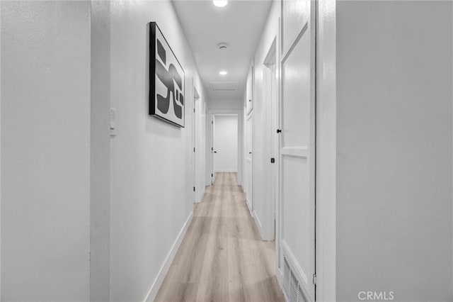 corridor featuring light hardwood / wood-style flooring