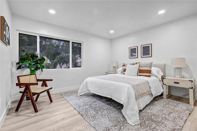 bedroom featuring light hardwood / wood-style floors