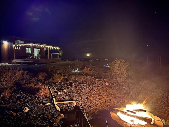 view of yard at twilight