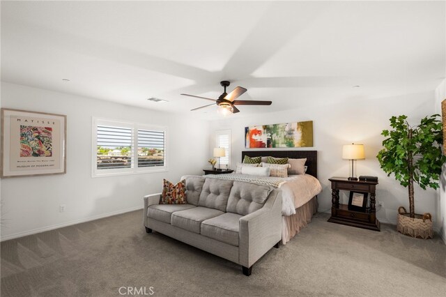 carpeted bedroom with ceiling fan