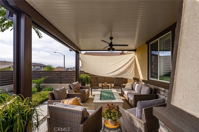 view of patio featuring ceiling fan and an outdoor hangout area