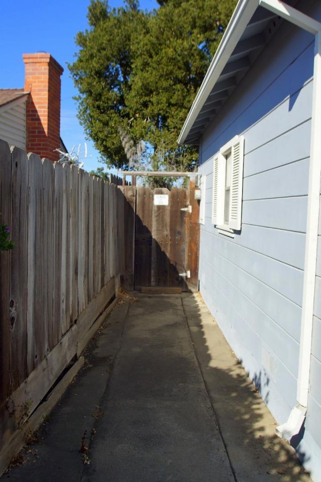 view of side of property with a patio