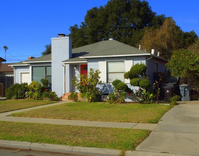 view of front of house with a front lawn