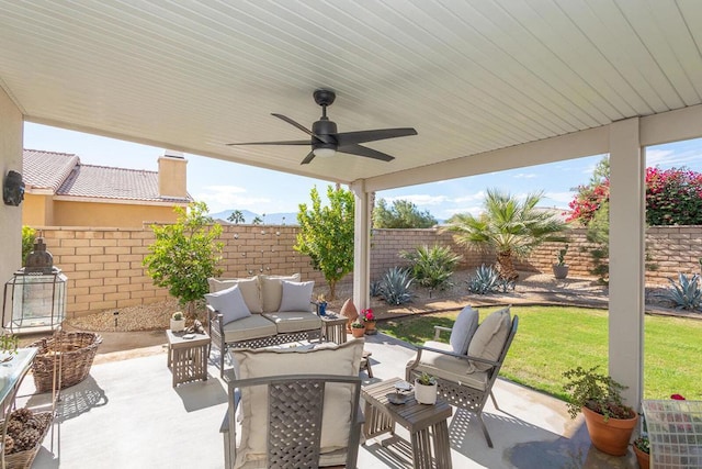 view of patio / terrace featuring an outdoor living space and ceiling fan