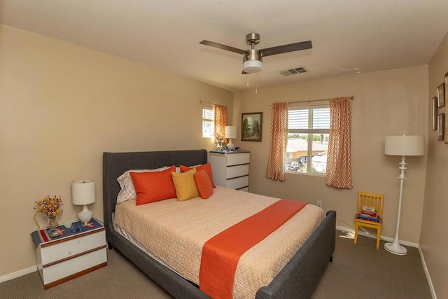 carpeted bedroom featuring ceiling fan