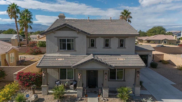 view of front of property with a mountain view