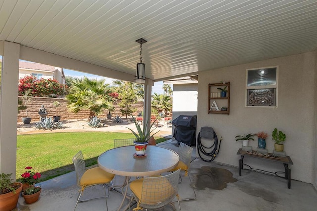 view of patio with a grill