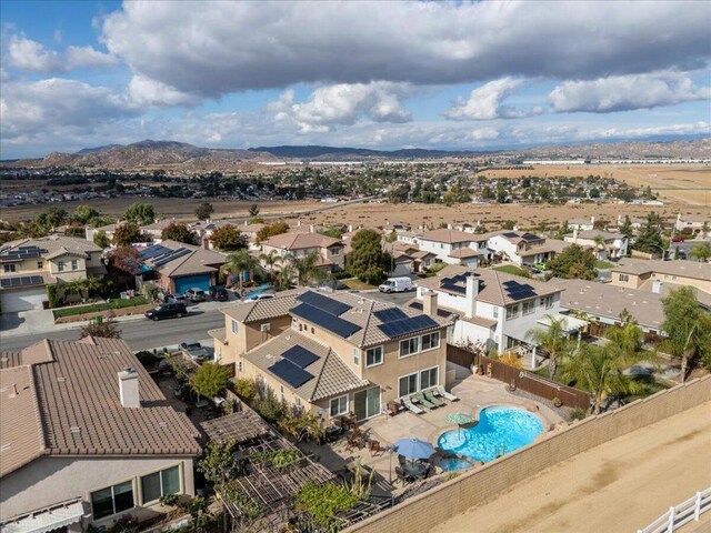 drone / aerial view featuring a mountain view