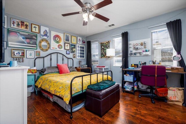 bedroom featuring ceiling fan and dark hardwood / wood-style flooring