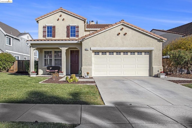 mediterranean / spanish house featuring a porch, a garage, and a front lawn