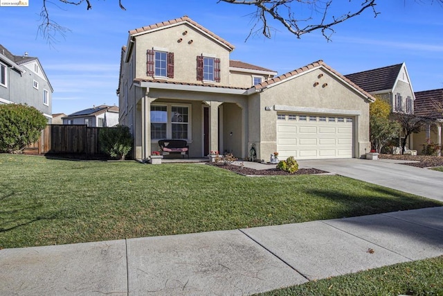 view of front of house with a porch, a garage, and a front lawn