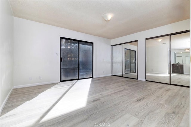 empty room featuring light wood-type flooring