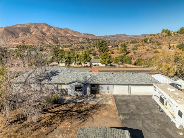 exterior space featuring a mountain view