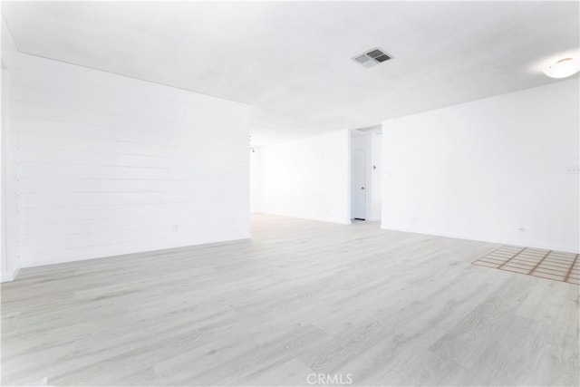 empty room with light wood-type flooring