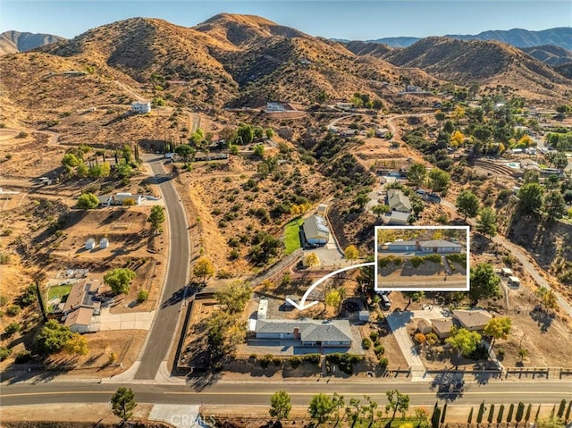 aerial view featuring a mountain view