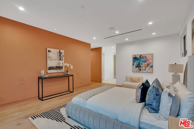 bedroom featuring light wood-type flooring