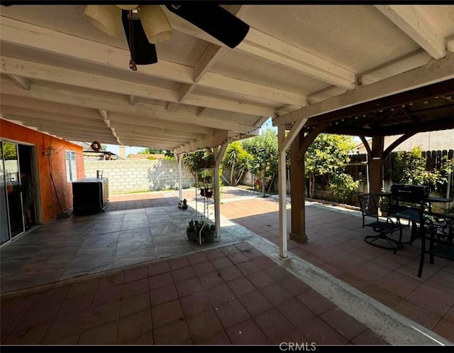 view of patio / terrace featuring ceiling fan