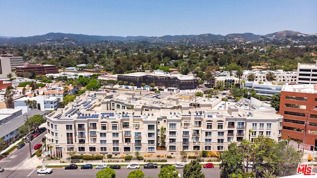 drone / aerial view featuring a mountain view