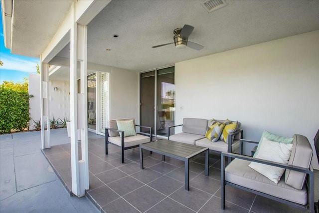 view of patio with ceiling fan and an outdoor hangout area