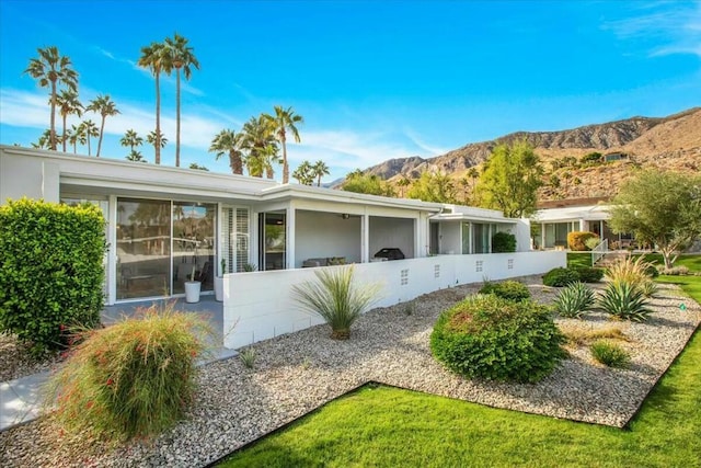 exterior space featuring a mountain view