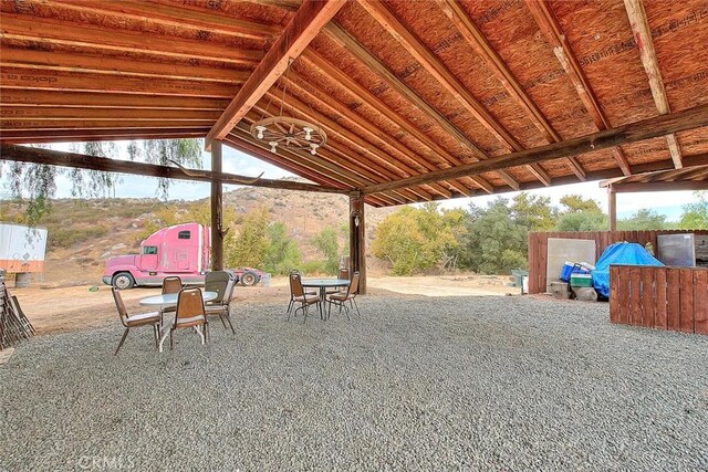 view of patio / terrace featuring a mountain view