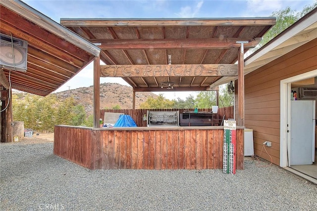 view of patio / terrace featuring a mountain view