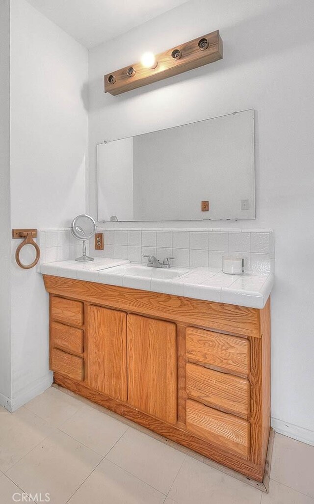 bathroom featuring tile patterned flooring