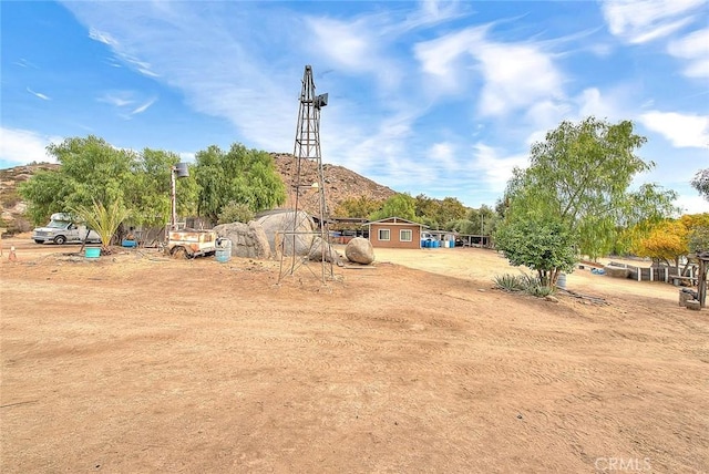 surrounding community featuring a mountain view