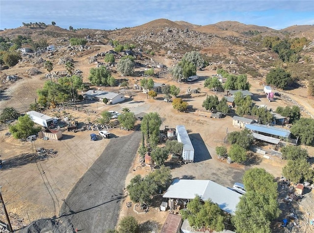 drone / aerial view featuring a mountain view